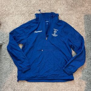 Sport-Tek Blue Windbreaker with CBS Sports Champions League Logo, NWOT